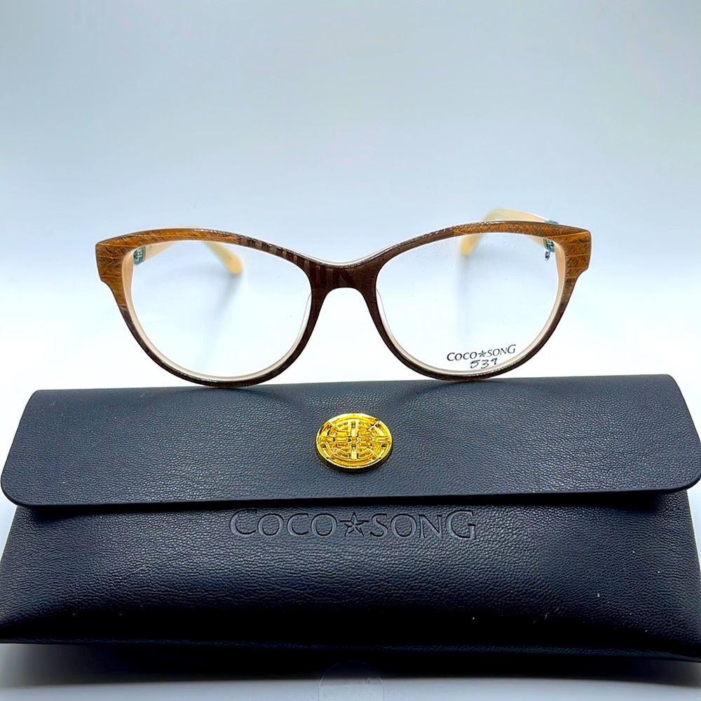 NWOT. Coco Song women’s Optical frames. Feathers and silk are imbedded.